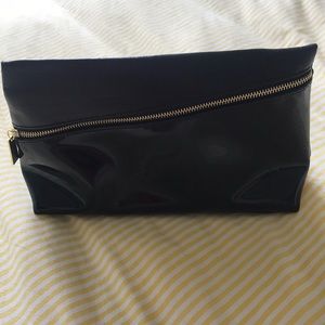 Black YSL beauty bag